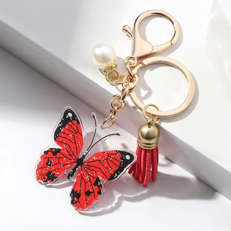 Wholesale Custom Printed Keychain Luxury Lobster Clasp Pearl Butterfly Pendant Cartoon Style Bag Car Acrylic Keychain Tassel
