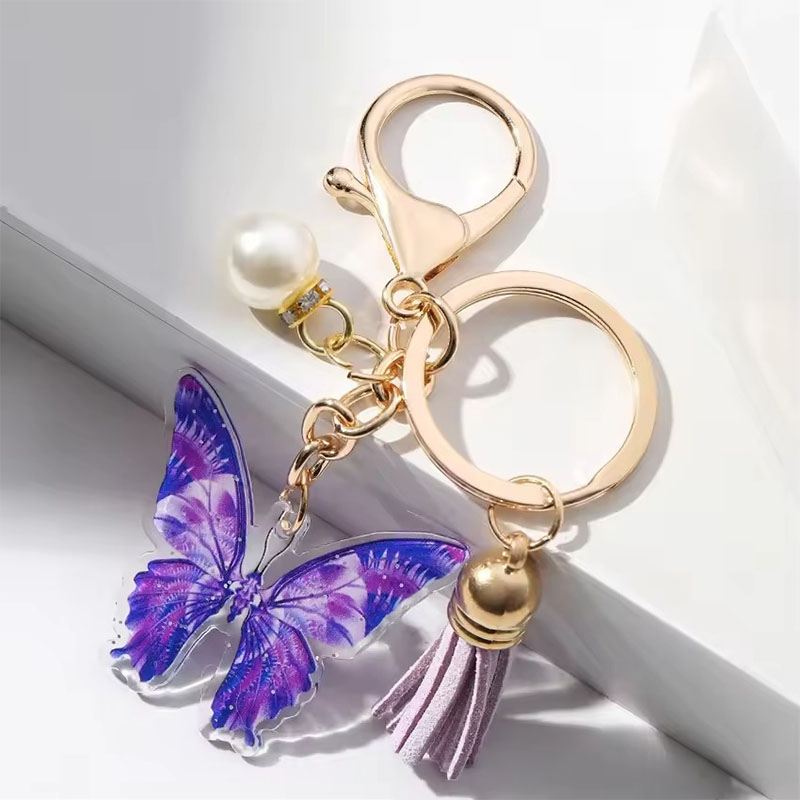 Wholesale Custom Printed Keychain Luxury Lobster Clasp Pearl Butterfly Pendant Cartoon Style Bag Car Acrylic Keychain Tassel