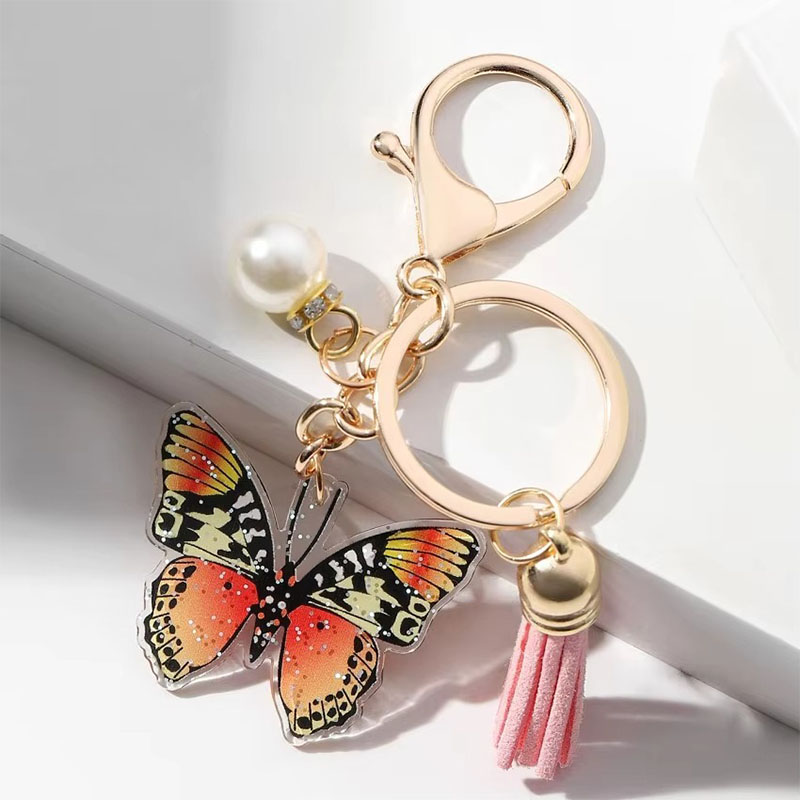 Wholesale Custom Printed Keychain Luxury Lobster Clasp Pearl Butterfly Pendant Cartoon Style Bag Car Acrylic Keychain Tassel