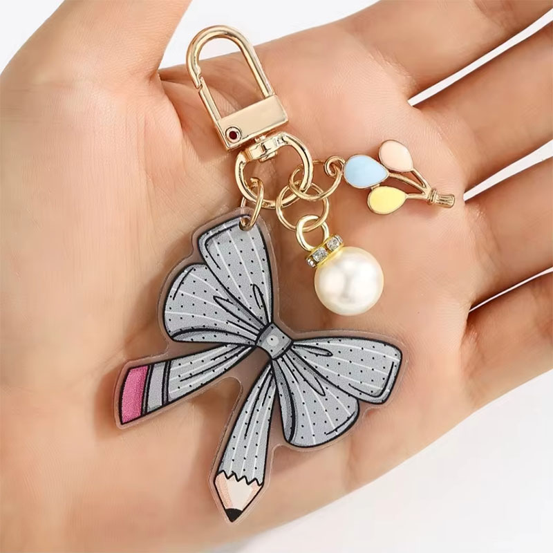 Wholesale Custom Plastic Acrylic Pencil Pearl Balloon Keychain Pendant Backpack with Custom Logo Made in China Zhejiang