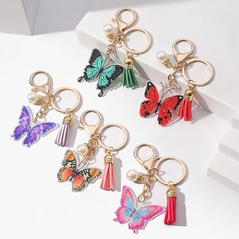 Wholesale Custom Printed Keychain Luxury Lobster Clasp Pearl Butterfly Pendant Cartoon Style Bag Car Acrylic Keychain Tassel
